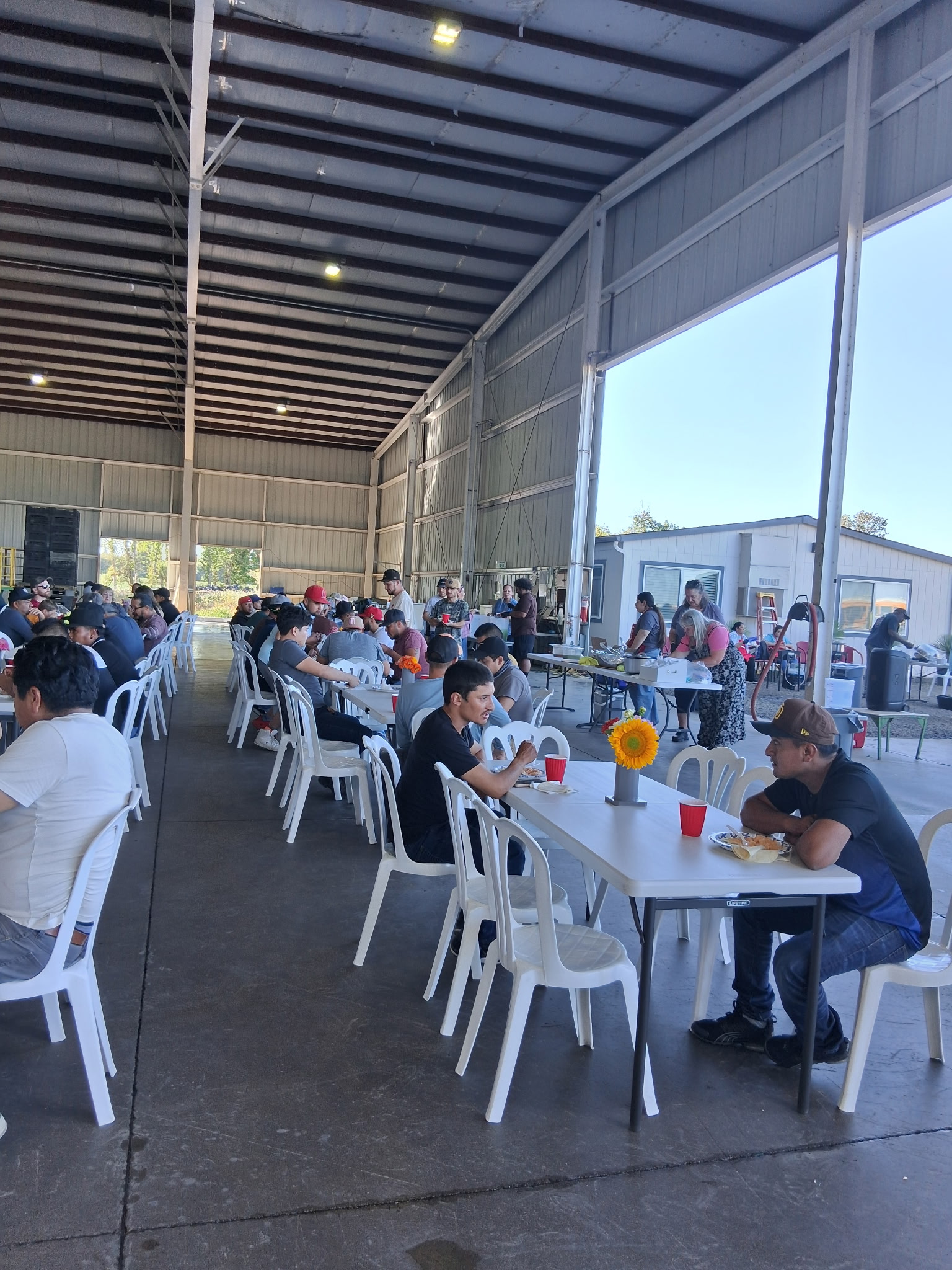 Gathering of people eating a meal together